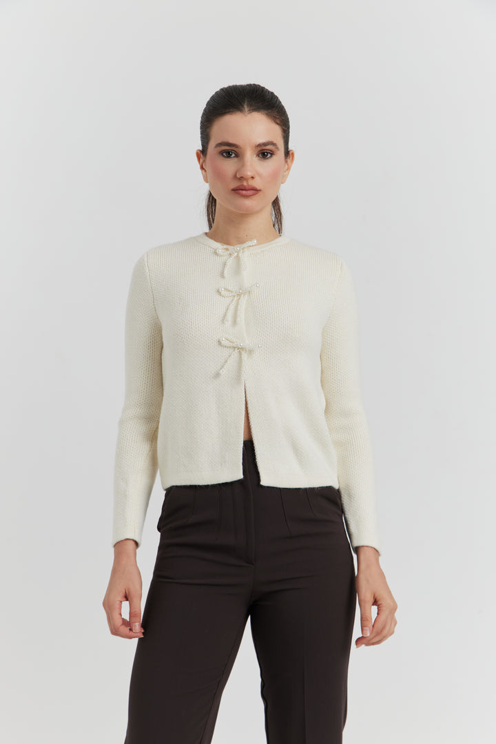 GILET BOUTONS PRESSIONS PERLES NYLERA ECRU