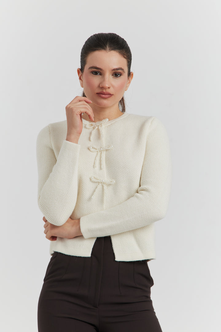 GILET BOUTONS PRESSIONS PERLES NYLERA ECRU