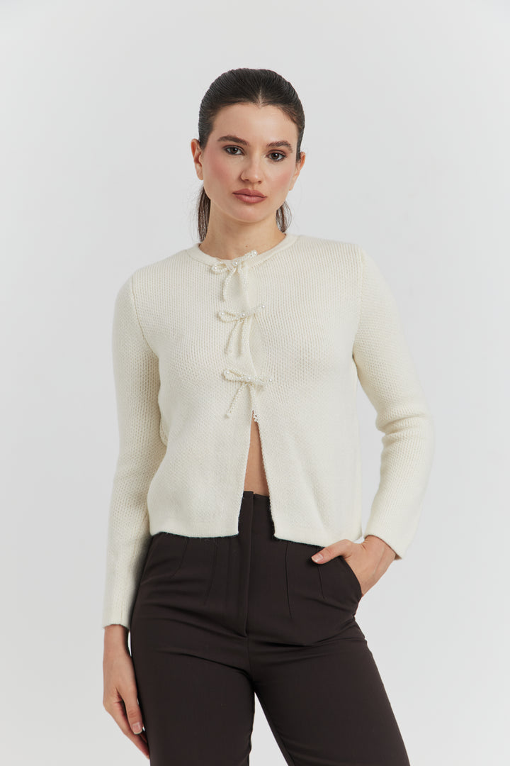 GILET BOUTONS PRESSIONS PERLES NYLERA ECRU